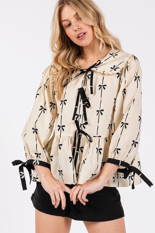 SAGE+FIG - Bow Print Tie Front Peplum Blouse in Cream