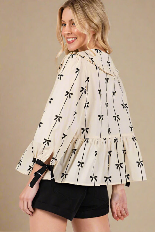 SAGE+FIG - Bow Print Tie Front Peplum Blouse in Cream