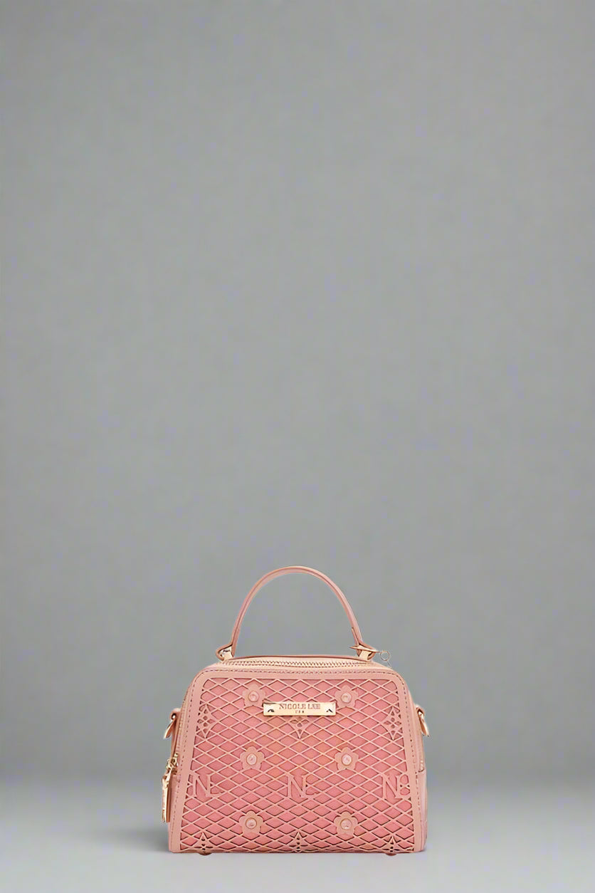 Pink handbag with gold accents on a white background