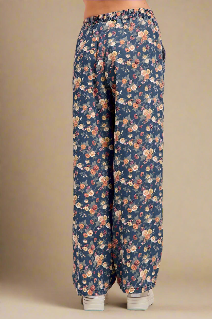 Floral-patterned pants on a plain background
