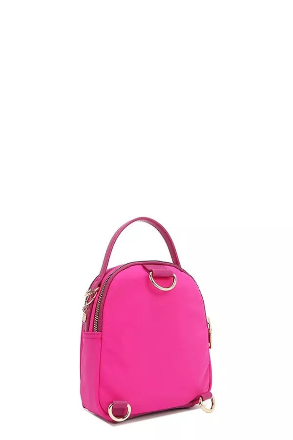 Pink backpack on a white background