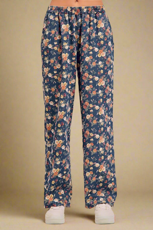 Floral patterned pants on a plain background