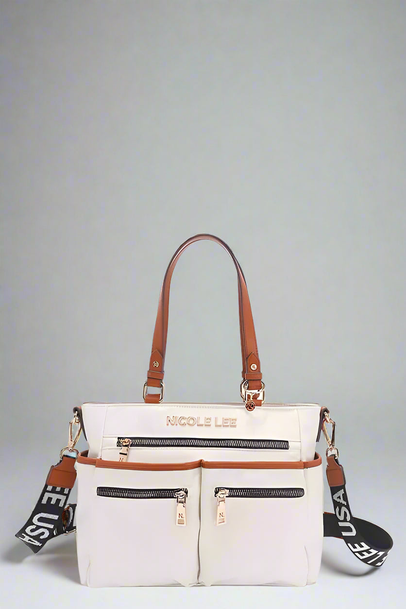 White handbag with brown straps and visible branding on a white background