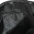Close-up of a black bag with a pocket on a white background