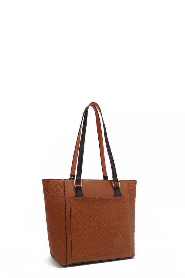 Brown tote bag with black straps on a white background