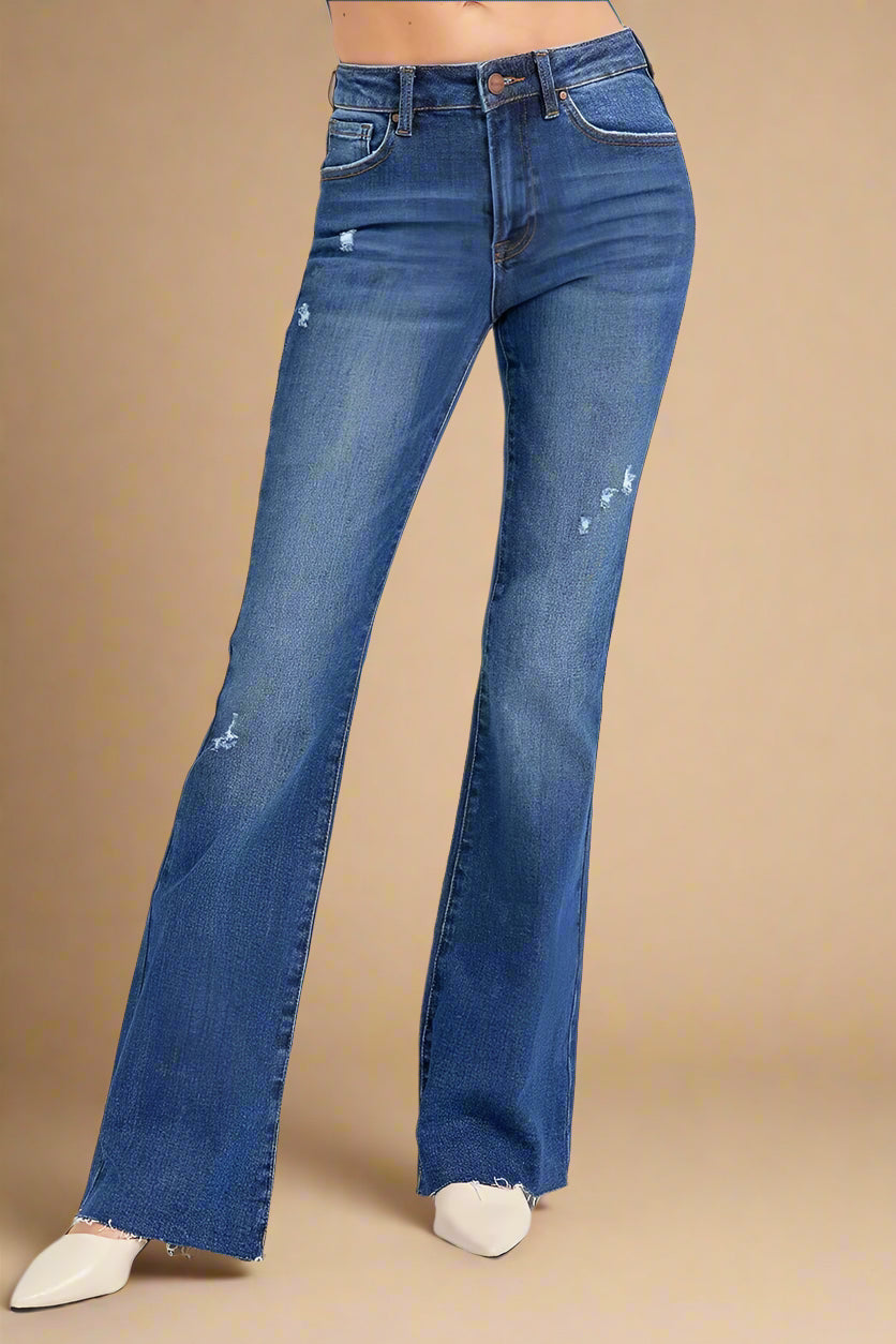 Blue flared jeans on a white background