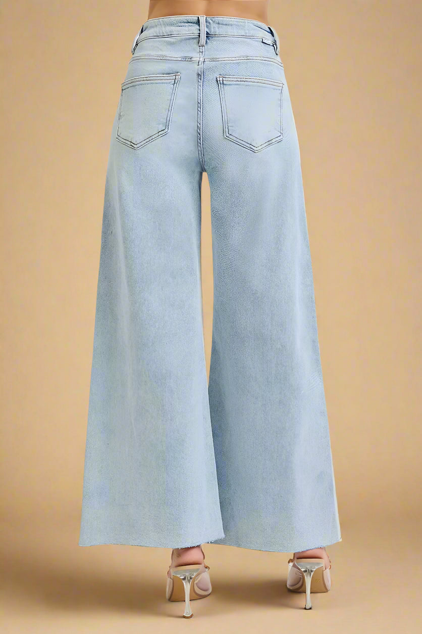 Light blue wide-leg jeans on a white background