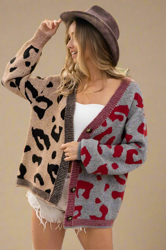 Woman wearing a patterned cardigan with a beige background