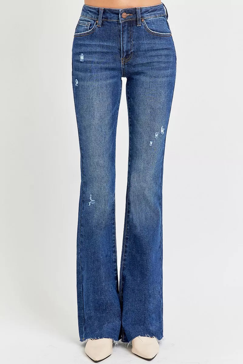 Blue flared jeans on a white background