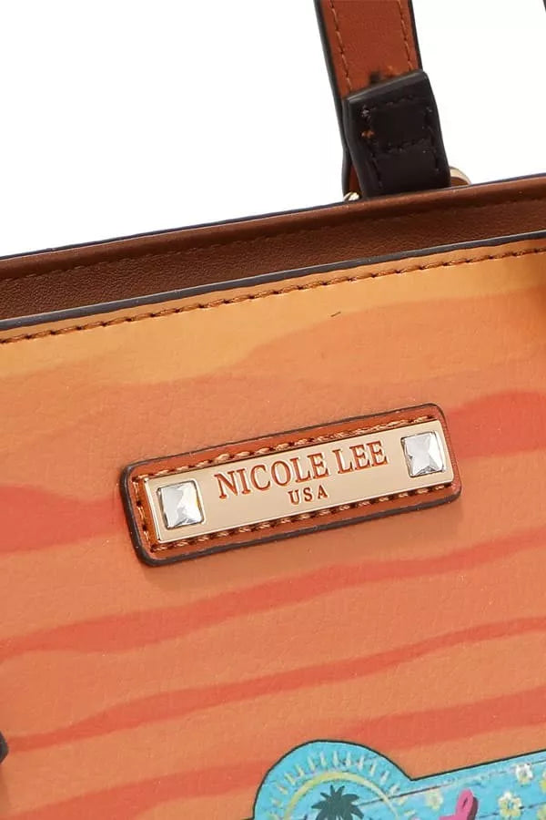 Close-up of a Nicole Lee handbag with a visible brand label.