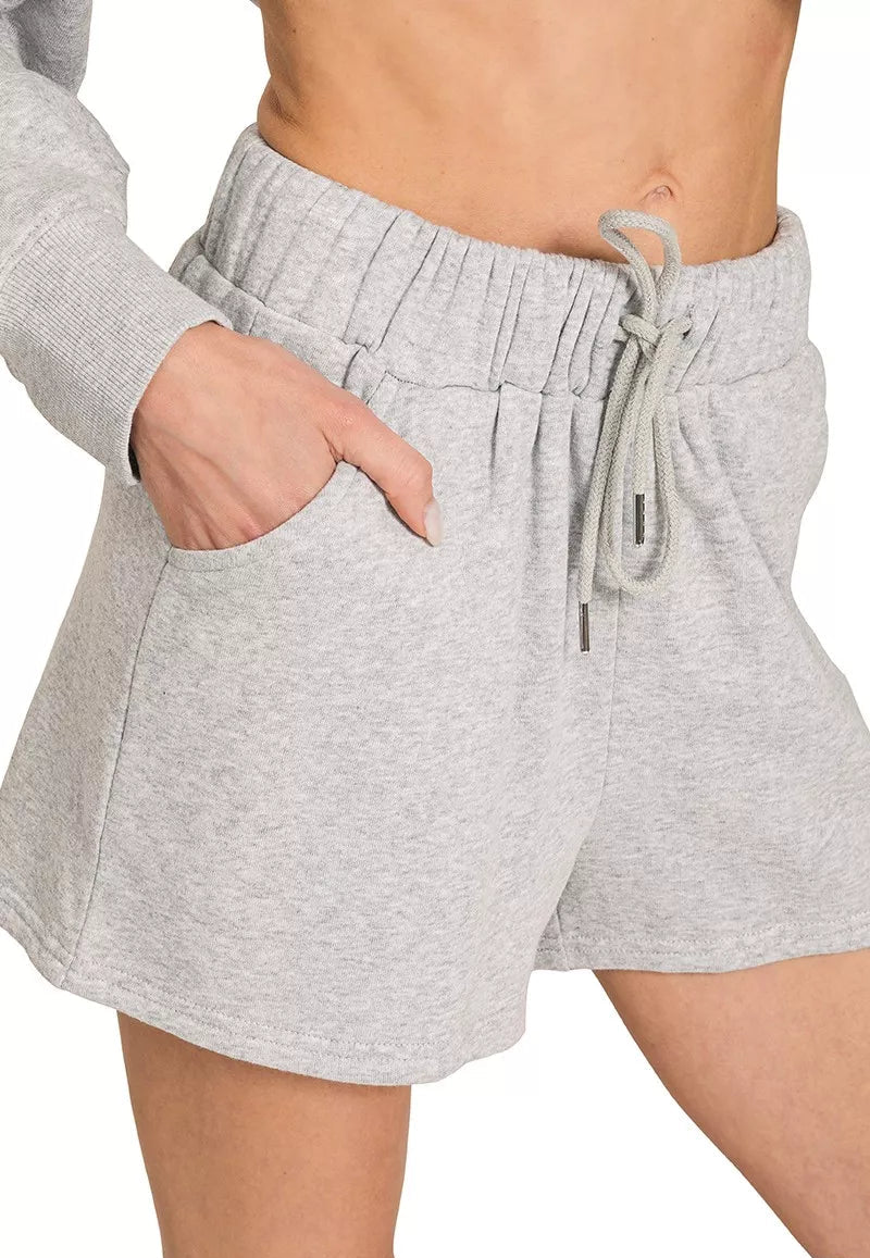 Gray shorts with drawstring on a white background