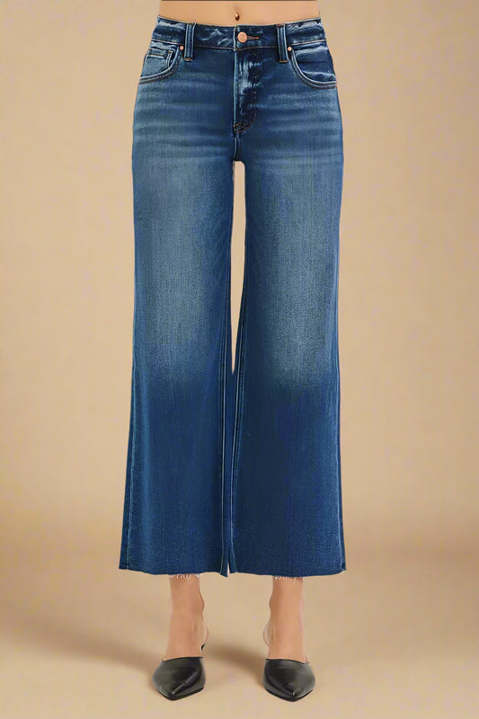 Blue jeans on a beige background