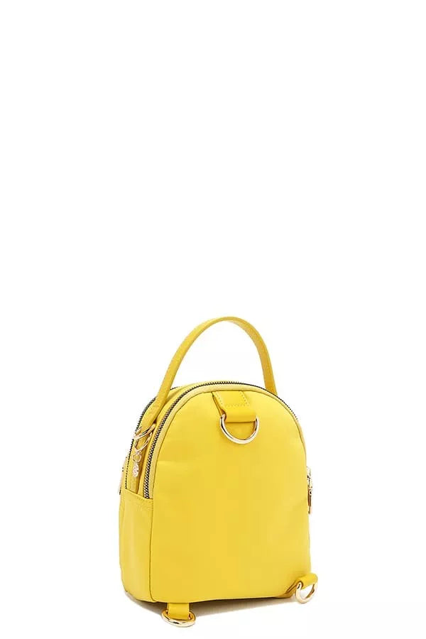 Yellow backpack on a white background