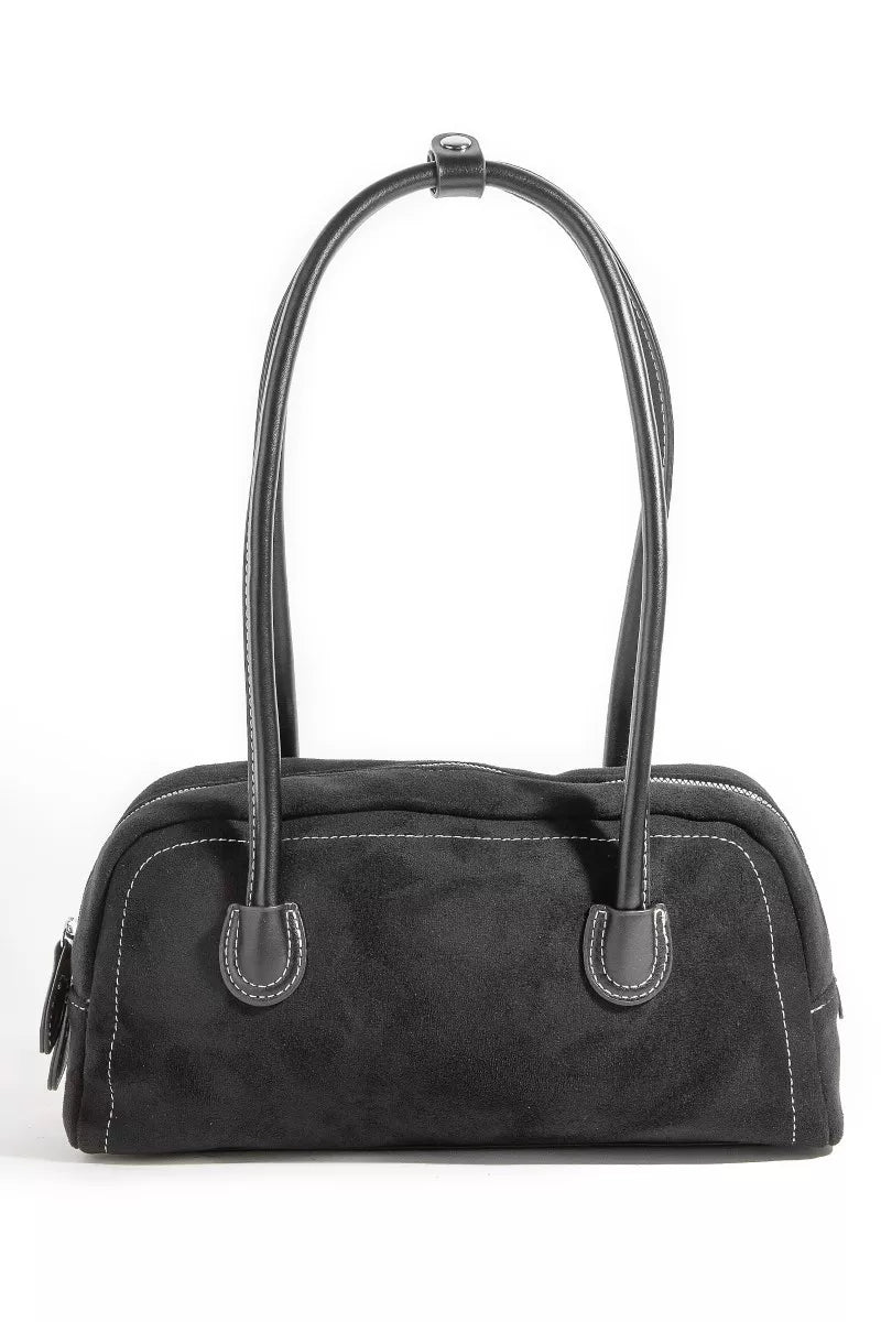 Black handbag with a strap on a white background
