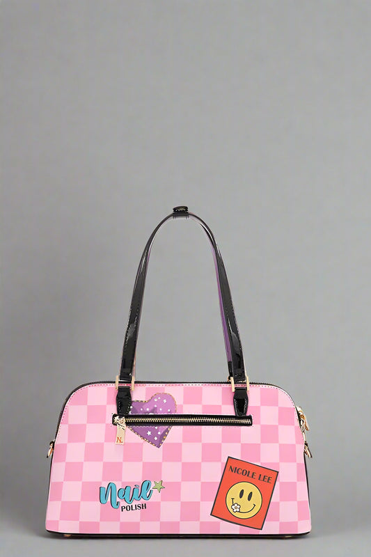 Pink checkered handbag with colorful patches on a white background