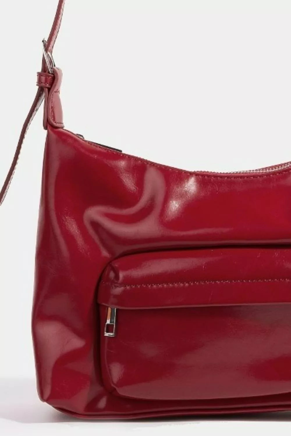 Red handbag on a white background
