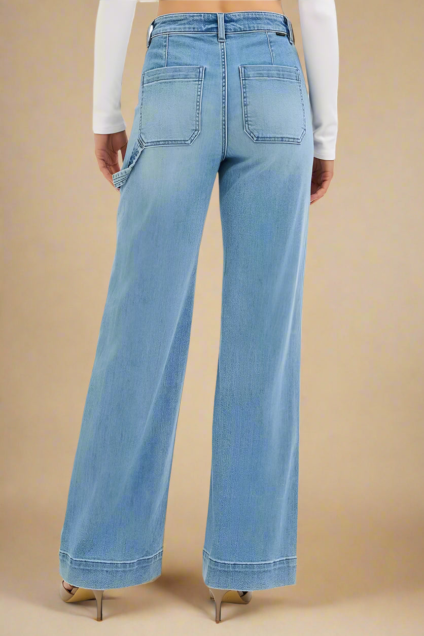 Light blue wide-leg jeans worn by a person on a white background