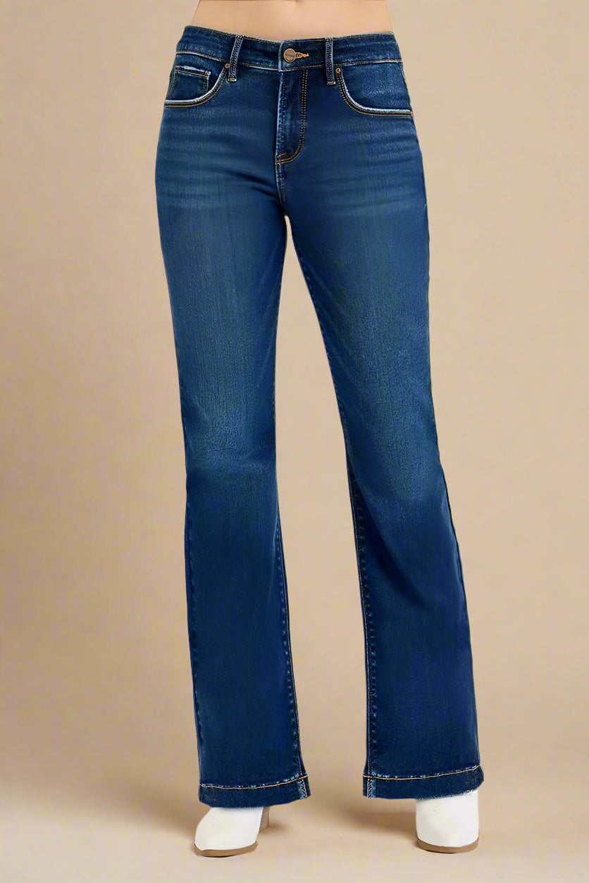 Blue jeans on a beige background