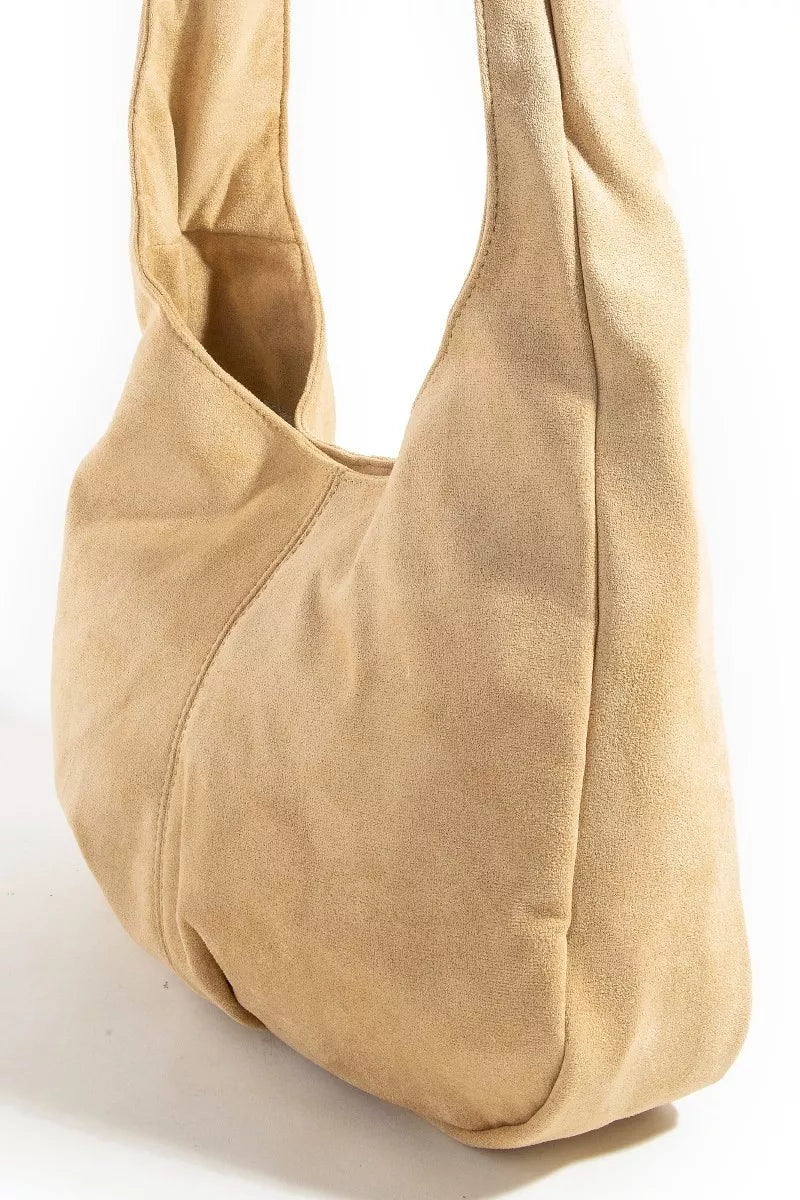 Beige handbag on a white background