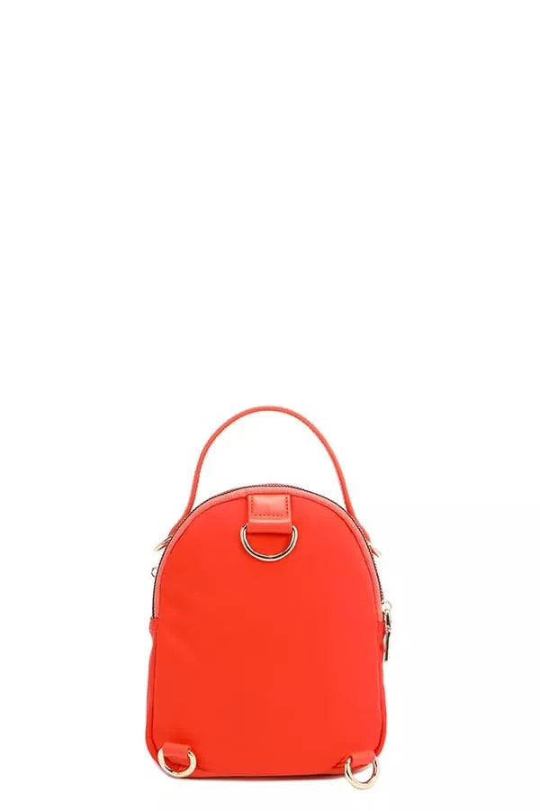 Red backpack on a white background