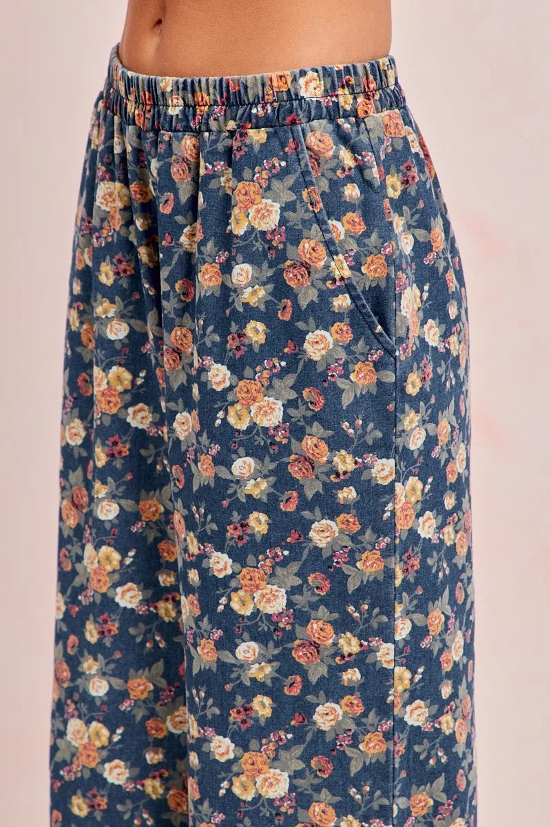 Floral patterned pants on a plain background