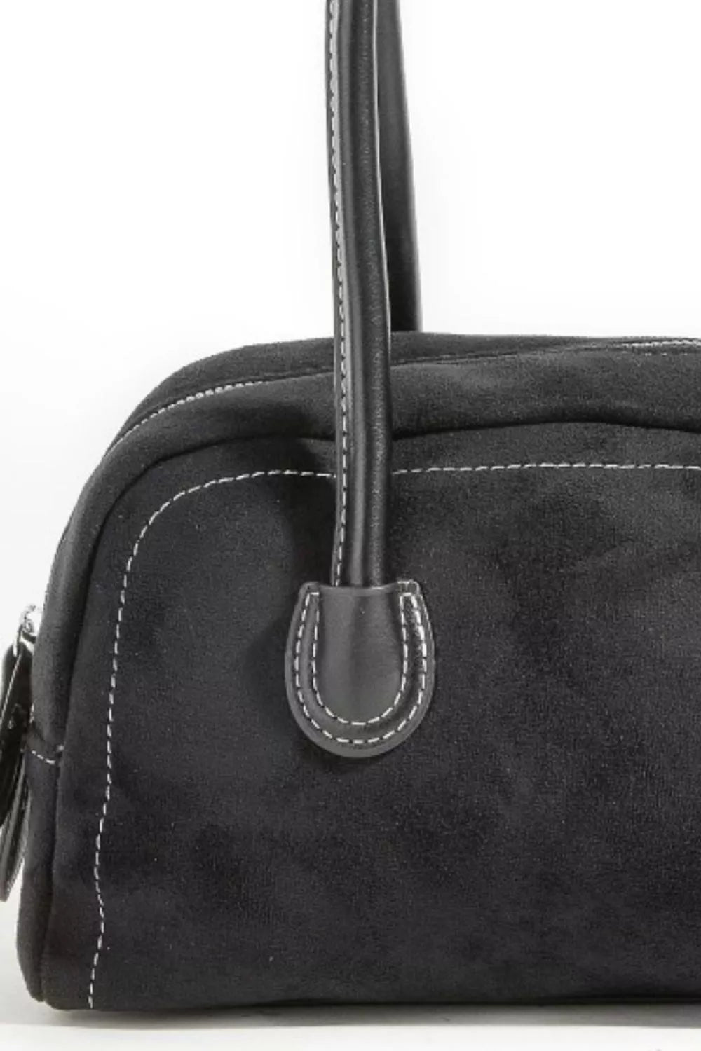 Black handbag with a strap on a white background