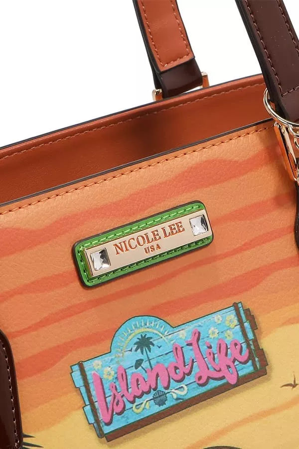 Close-up of a handbag with 'Nicole Lee' label and 'Island Life' patch on an orange background