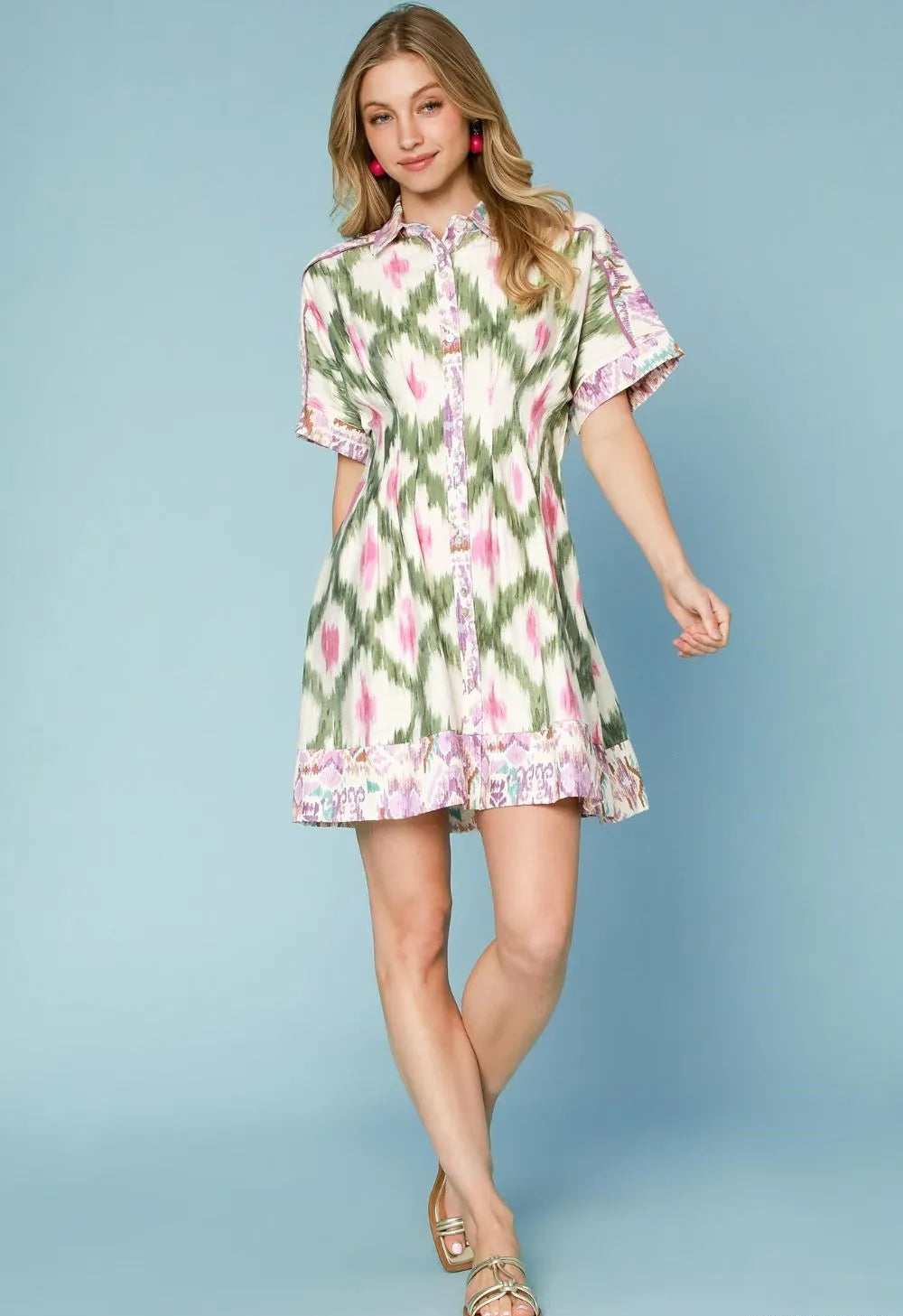 Woman wearing a floral dress on a blue background