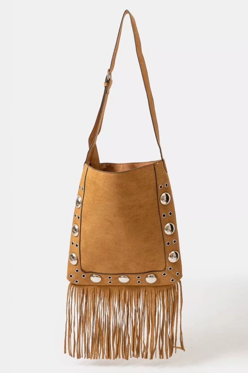 Brown suede handbag with fringe and decorative studs on a white background