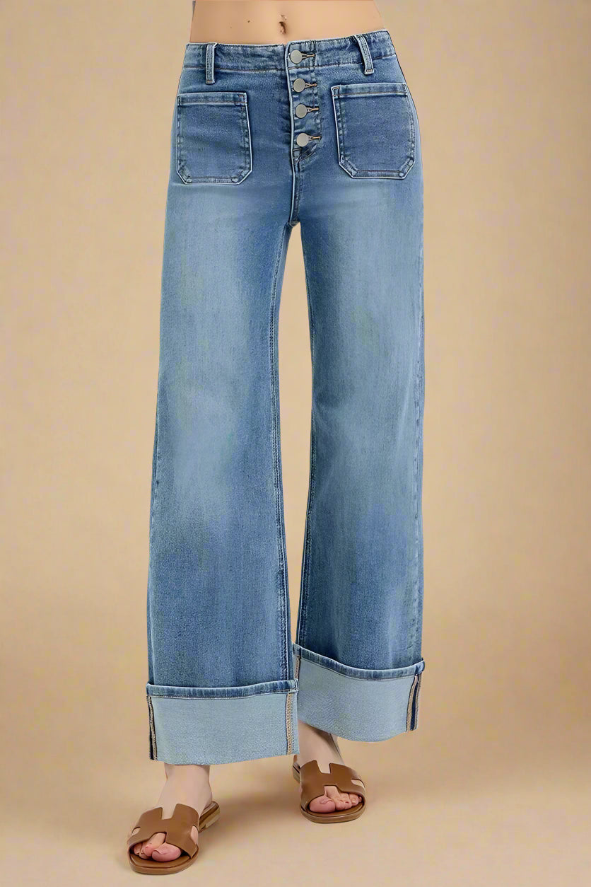Wide-leg jeans with button fly on a white background