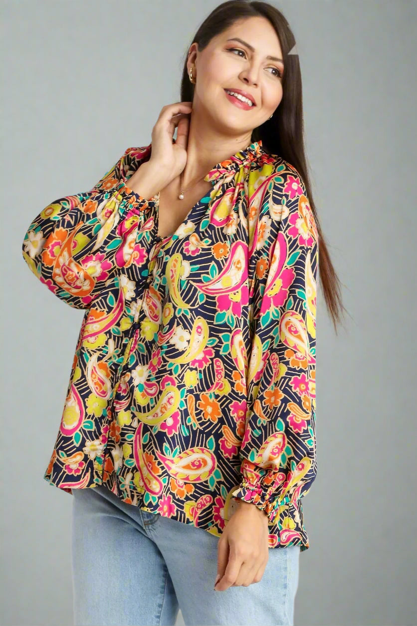 Woman wearing a colorful floral blouse