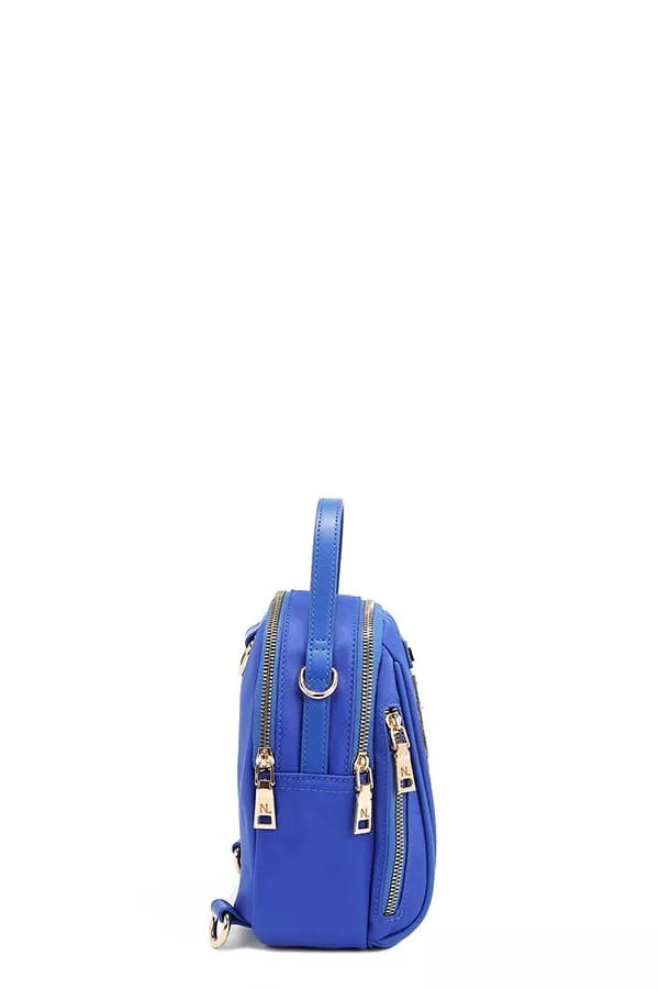Blue backpack with gold zippers on a white background