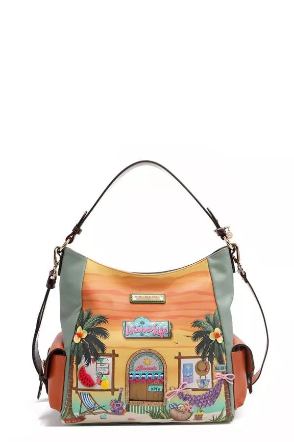 Colorful handbag with a tropical design featuring a building and palm trees on a white background.