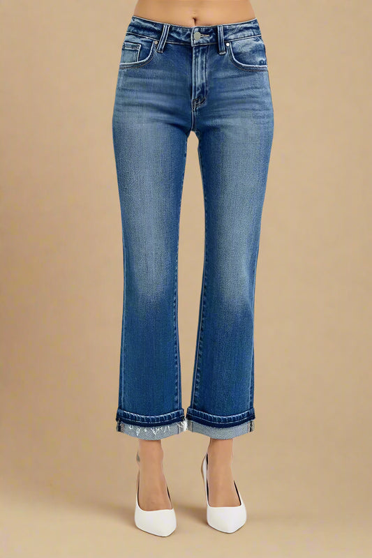 Blue jeans with a beige background