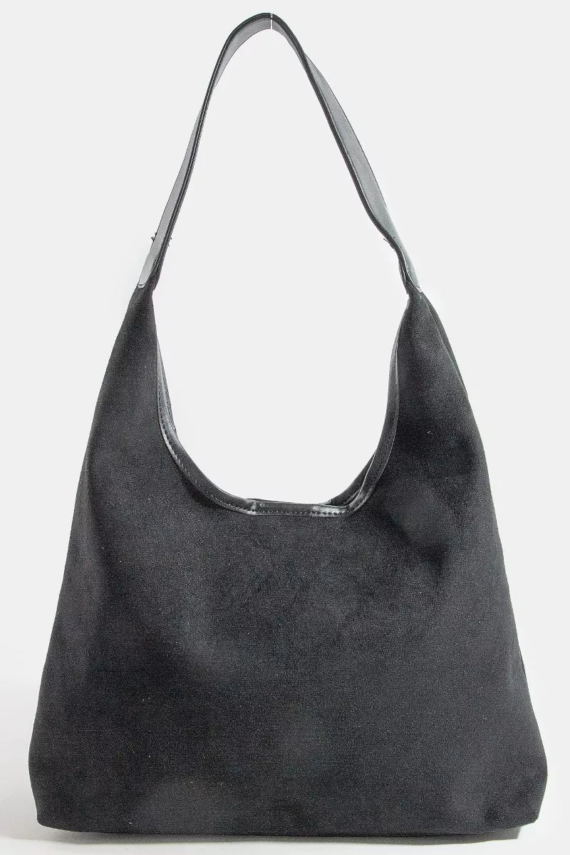 Black handbag on a white background