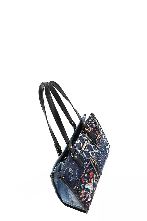 Blue floral-patterned backpack on a white background