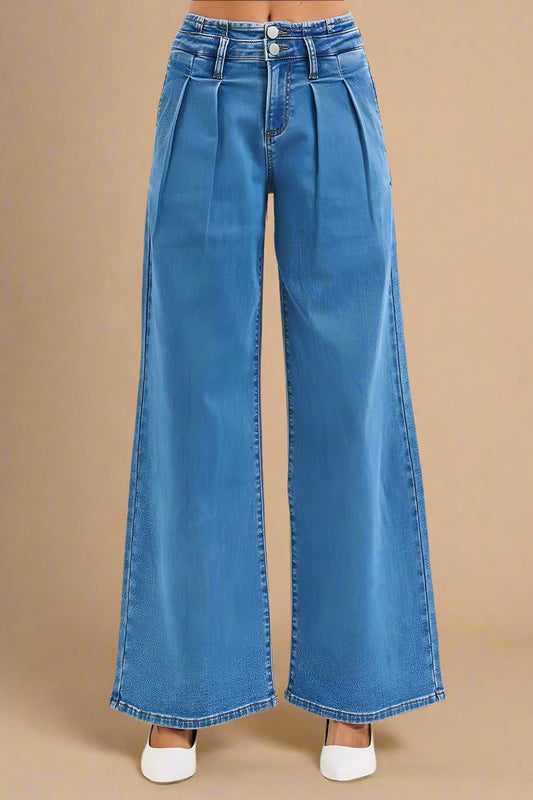 Blue wide-leg jeans on a white background