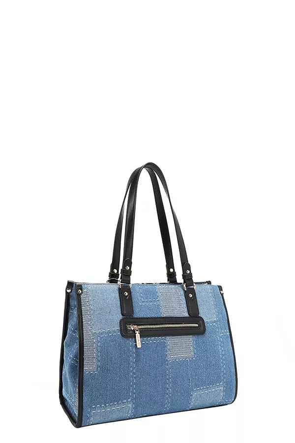 Blue denim handbag with black handles and zippers on a white background