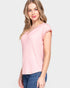 Woman wearing a pink top and blue jeans on a white background