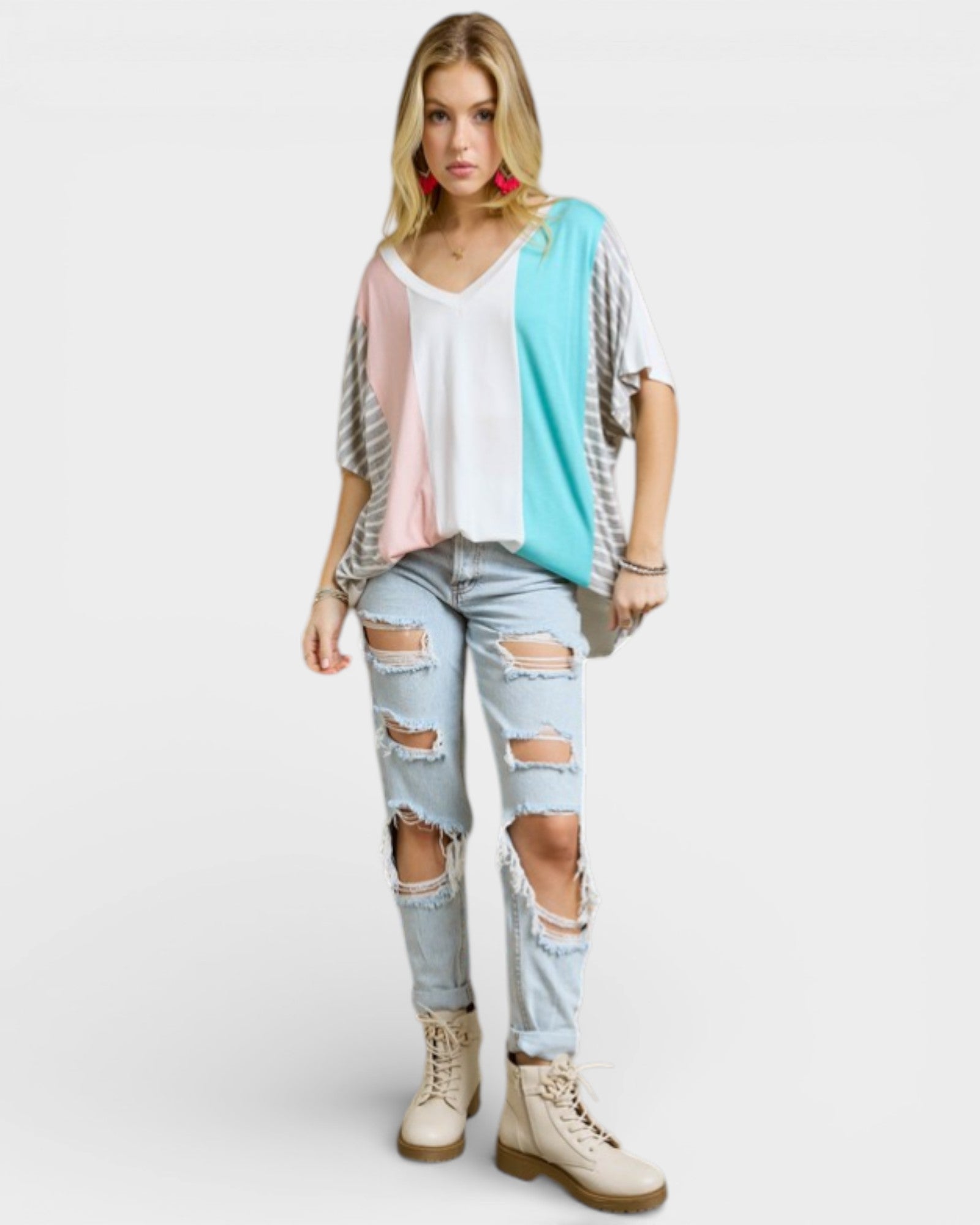 Woman wearing a colorful outfit with a white background