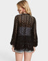 Woman wearing a black crochet top on a white background