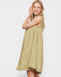 Woman wearing a green dress on a white background