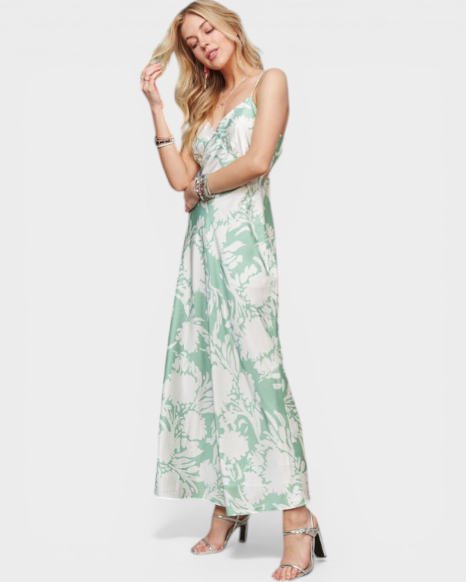 Woman wearing a floral dress on a white background