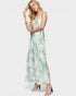 Woman wearing a floral dress on a white background