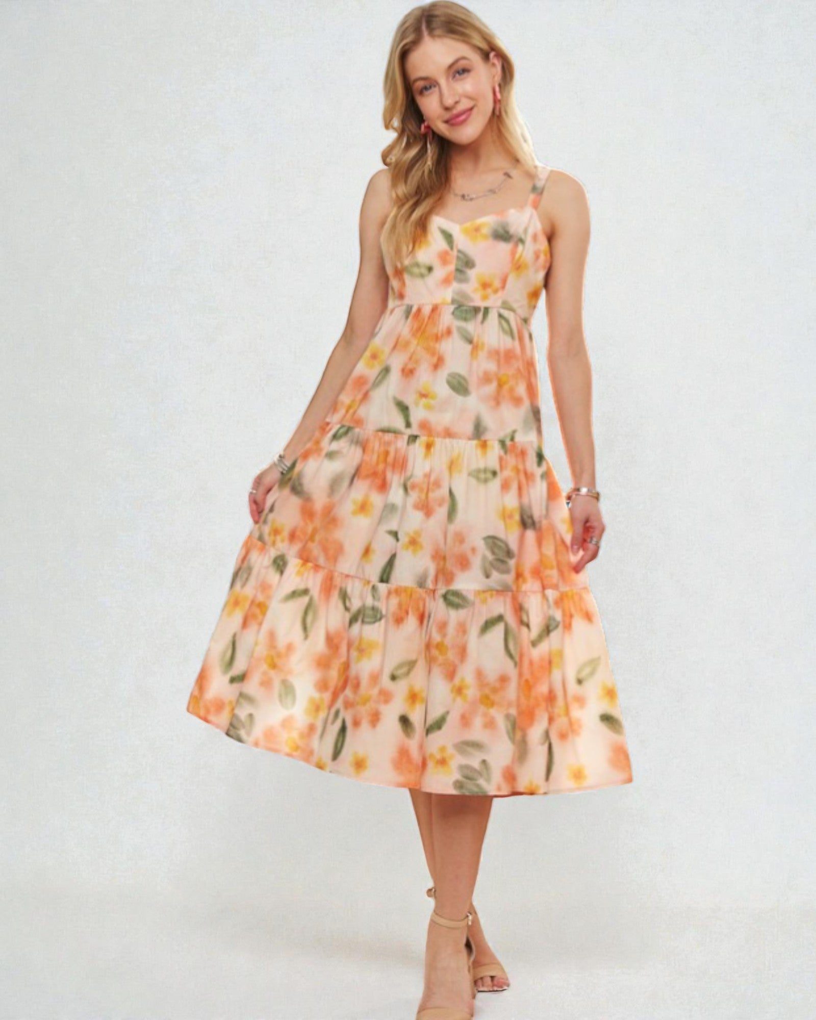 Woman wearing a floral dress on a white background