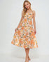 Woman wearing a floral dress on a white background