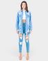 Woman wearing a distressed denim outfit on a white background