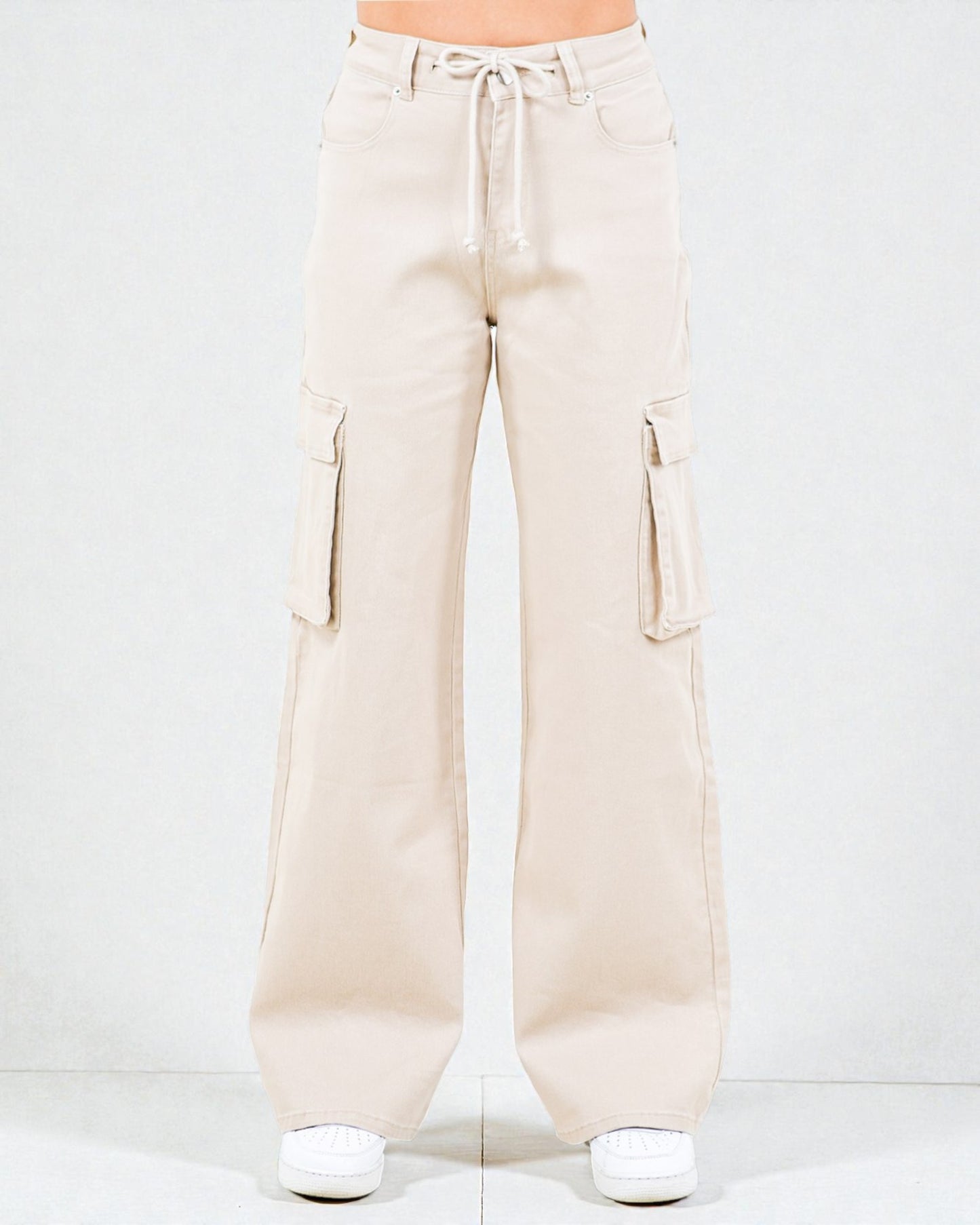 Beige cargo pants on a white background