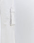 Close-up of a white shirt with a pocket on a light gray background