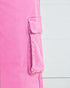 Close-up of a pink garment with a pocket on a white background